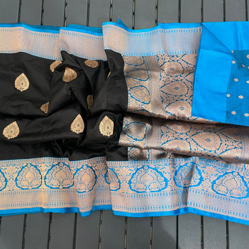 Stunning black large buta katan silk with contrast Turquoise intricate zari woven large border and Pallu