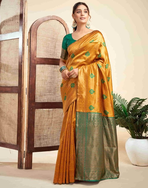 Turmeric Yellow Banarasi Silk Woven Saree with Golden Jacquard Work and Contrasting Green Blouse