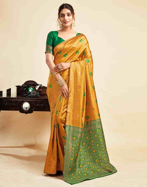 Radiant Turmeric Yellow Banarasi Silk Woven Saree with Green Jacquard Border – Perfect for Weddings & Festive Celebrations