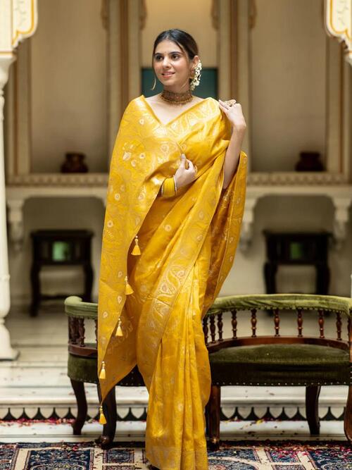 Yellow color brocade aura silk saree