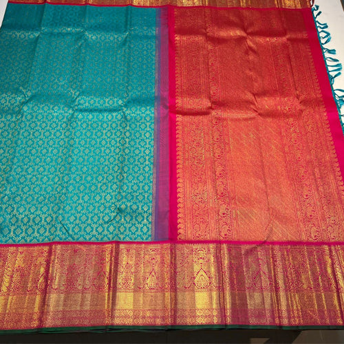 Pastel green with pink color kanjivaram traditional korvai silk saree