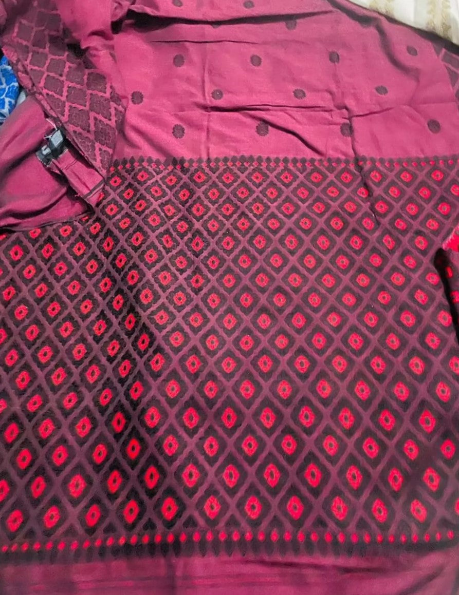 Raspberry Pink Base Kamrup cotton with black butis all over and beautifull woven contrast Pallu with red and Black diamond shape weaves - Sarikart Online