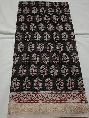 Black with large flower motifs and zari border