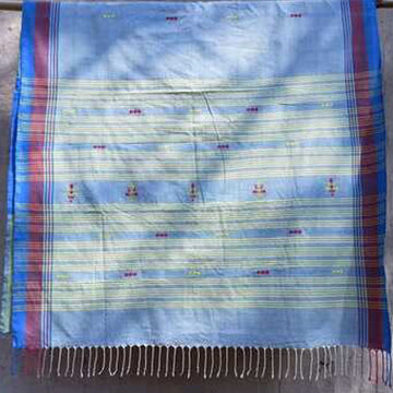 Blue color with maroon butis all over with a contrast blue plain border & pallu