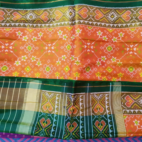 Patola single ikkat orange with bottle green border saree