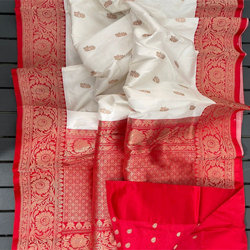 Gorgeous White large buta katan silk with contrast Red intricate zari woven large border and Pallu