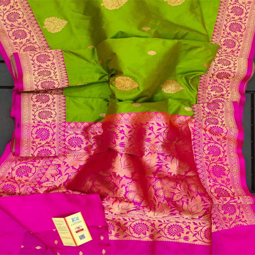 Gorgeous Parrot green large buta katan silk with contrast Pink intricate zari woven large border and Pallu