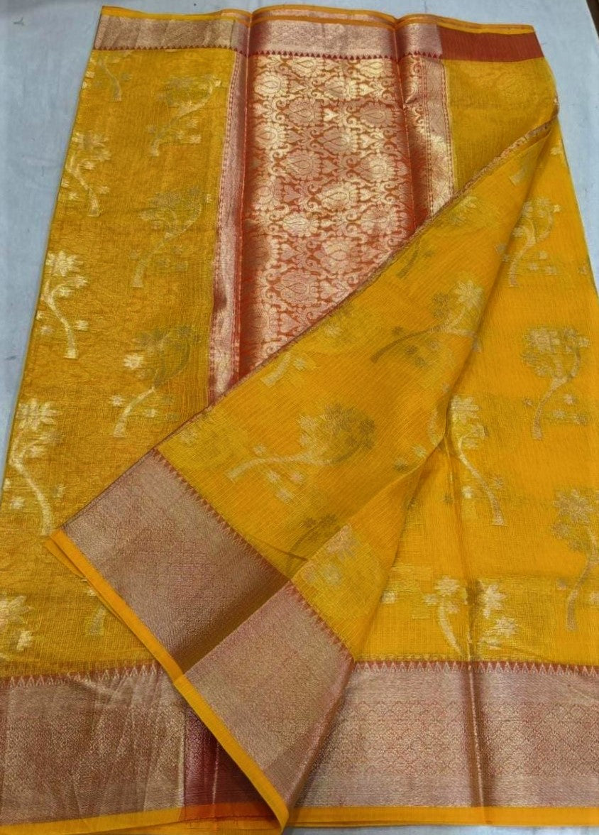 Yellow with all over Zari and large Border