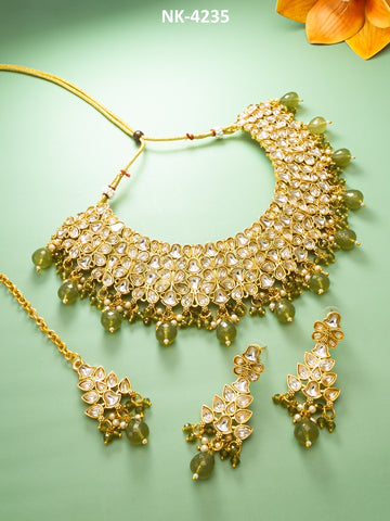 Stone-Studded  Beaded Necklace With Earrings And Maang Tika